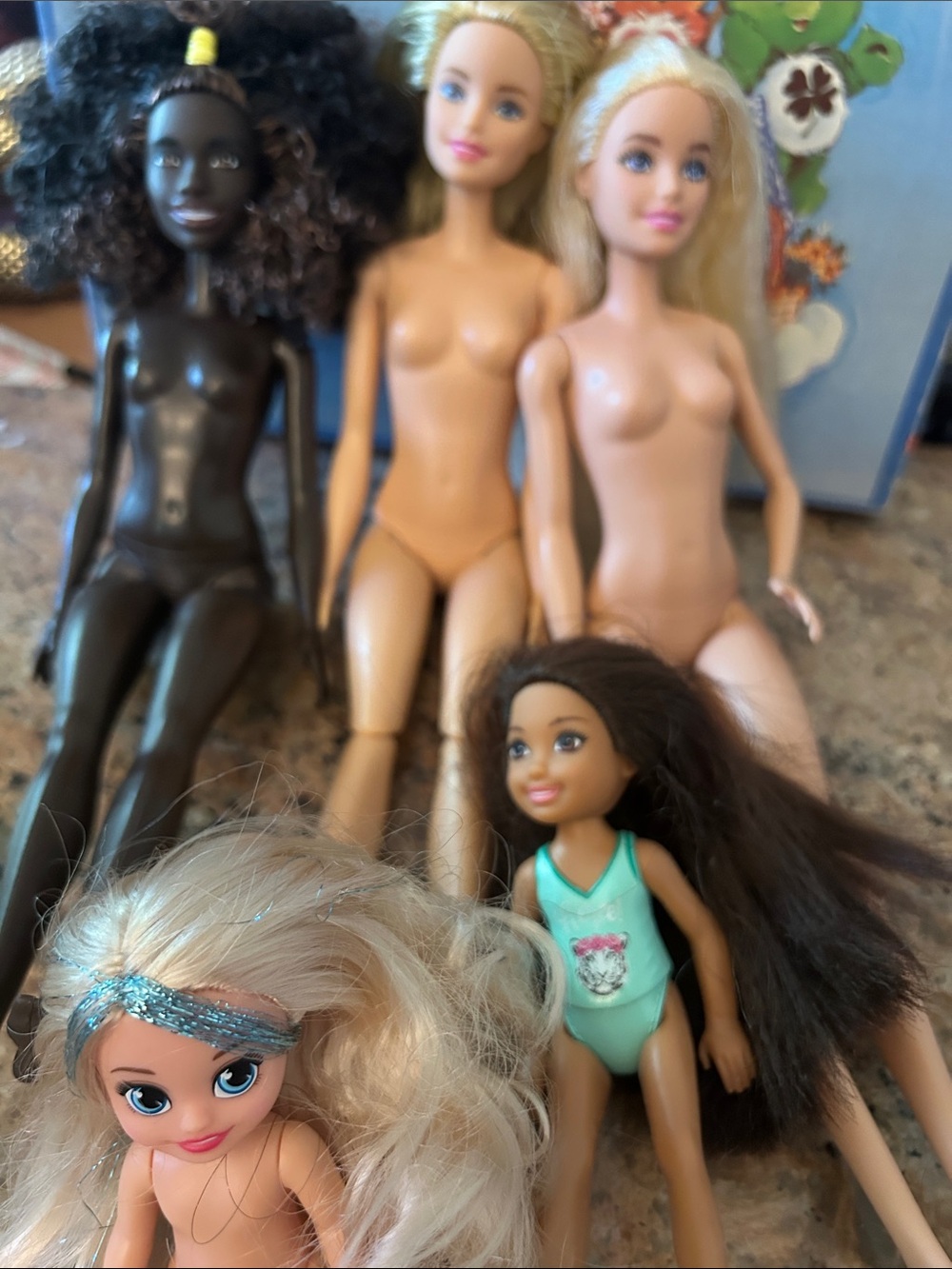 Various barbie dolls